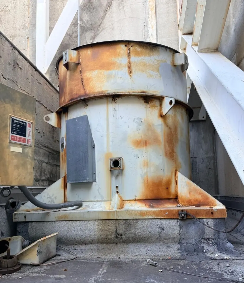 Before — heavy rust and coil corrosion on commercial HVAC unit